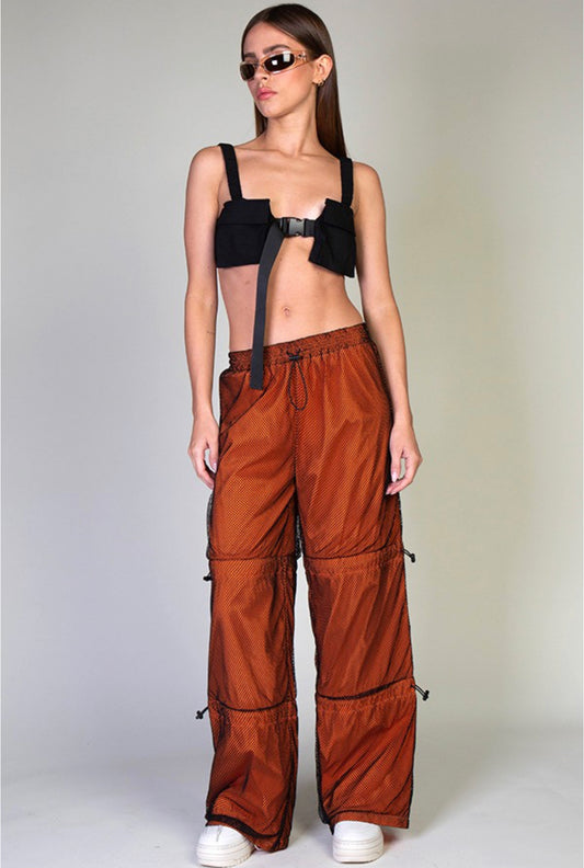 Orange parachute pants